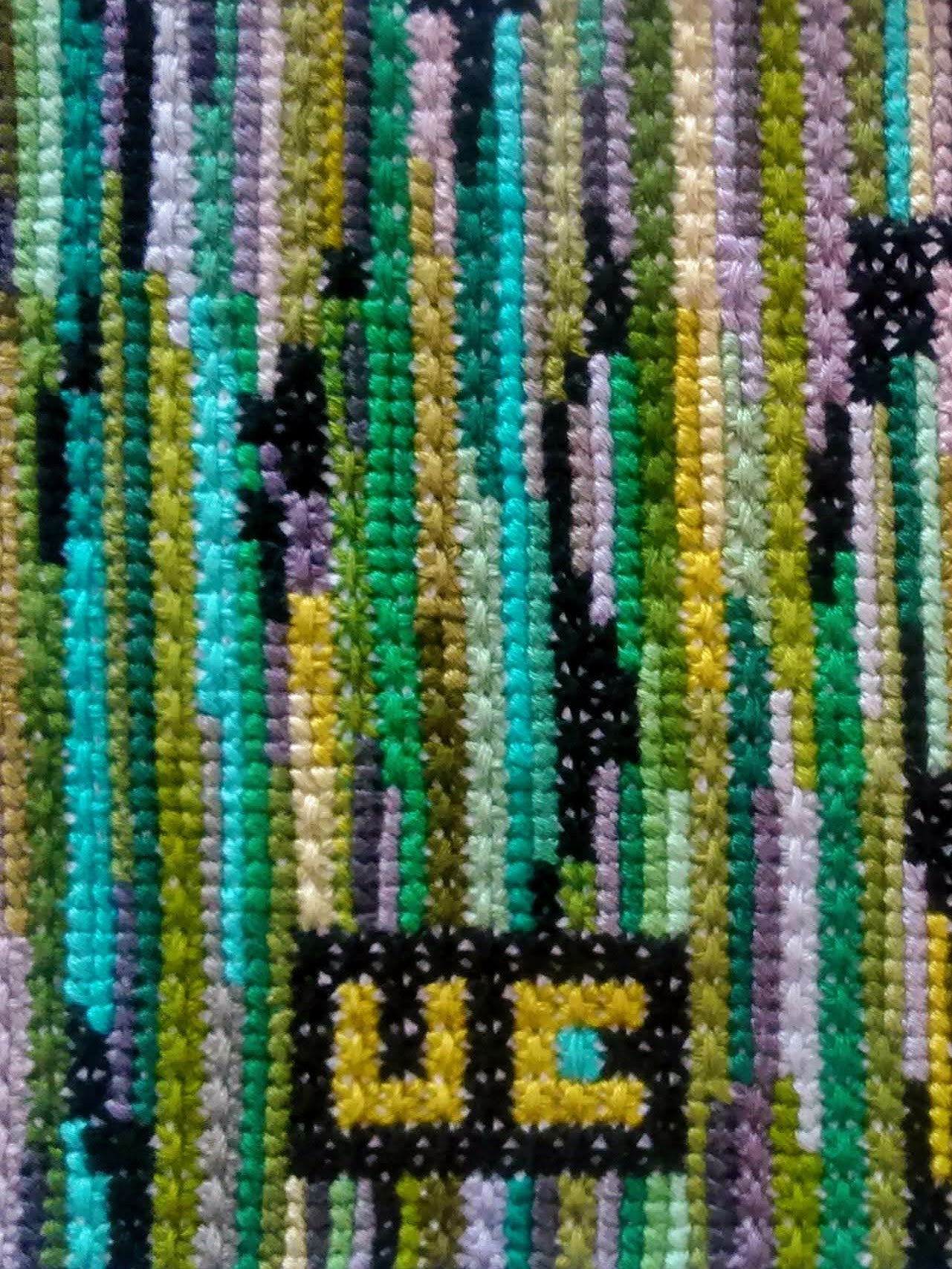 Monochrome green design of pattern created by hand embroidery artist Anya Isac for Unique Embroidery case