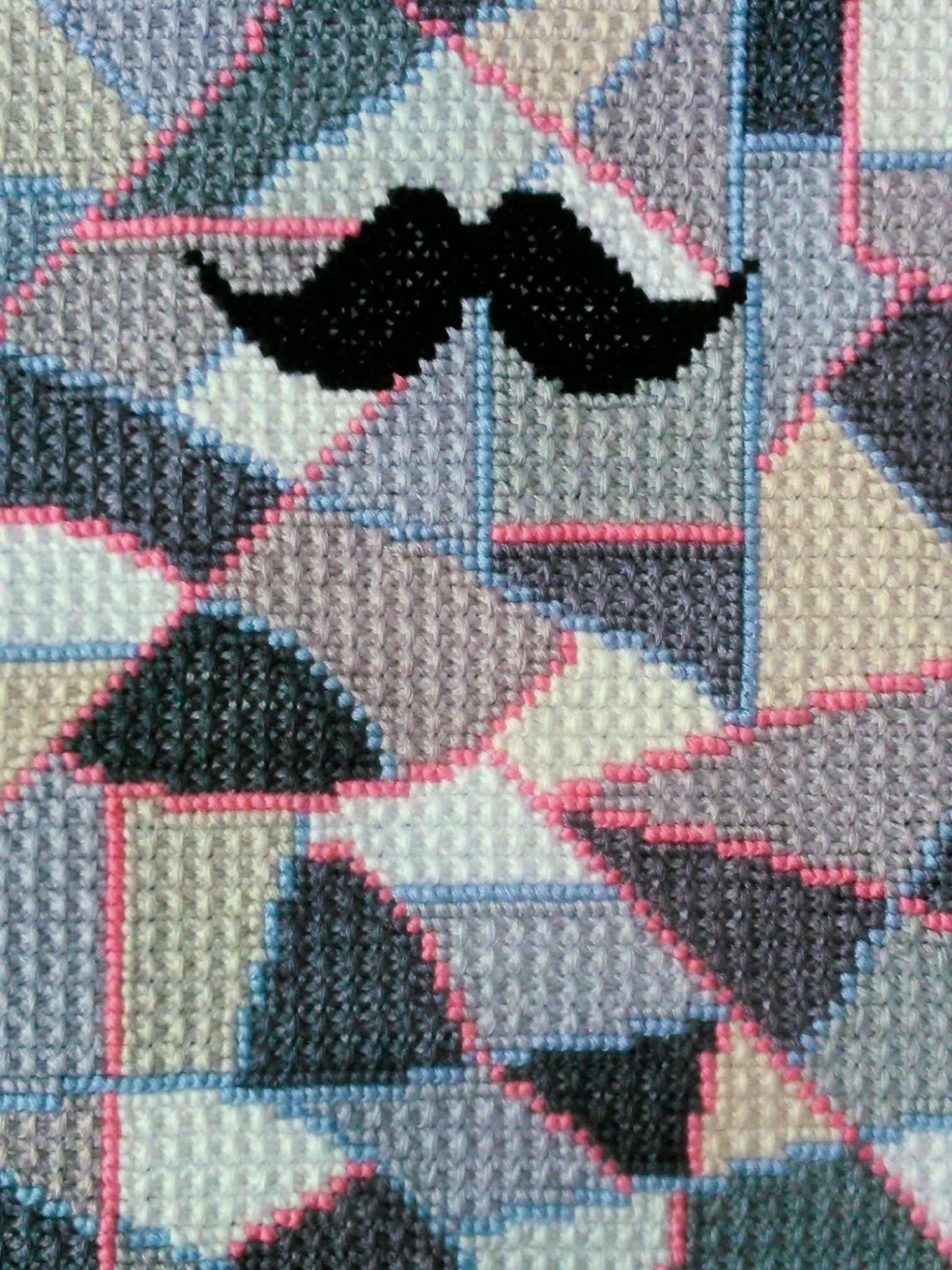 Abstract moustache pattern created by hand embroidery artist Anya Isac for making Unique Embroidery purse